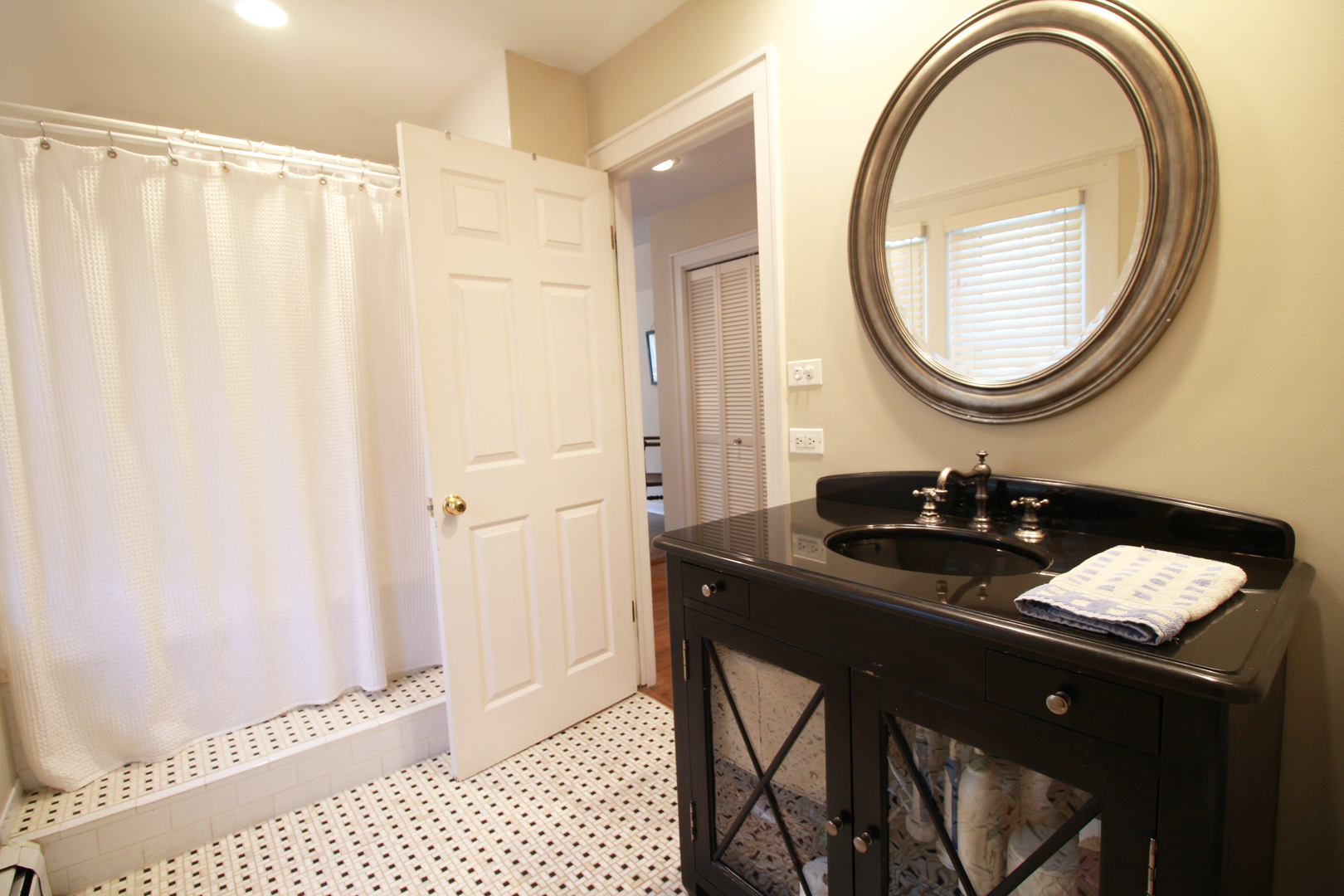 200 Ravine Road Hinsdale, IL 60521 - Photo 18 of 29 a bathroom with a sink a toilet and a mirror