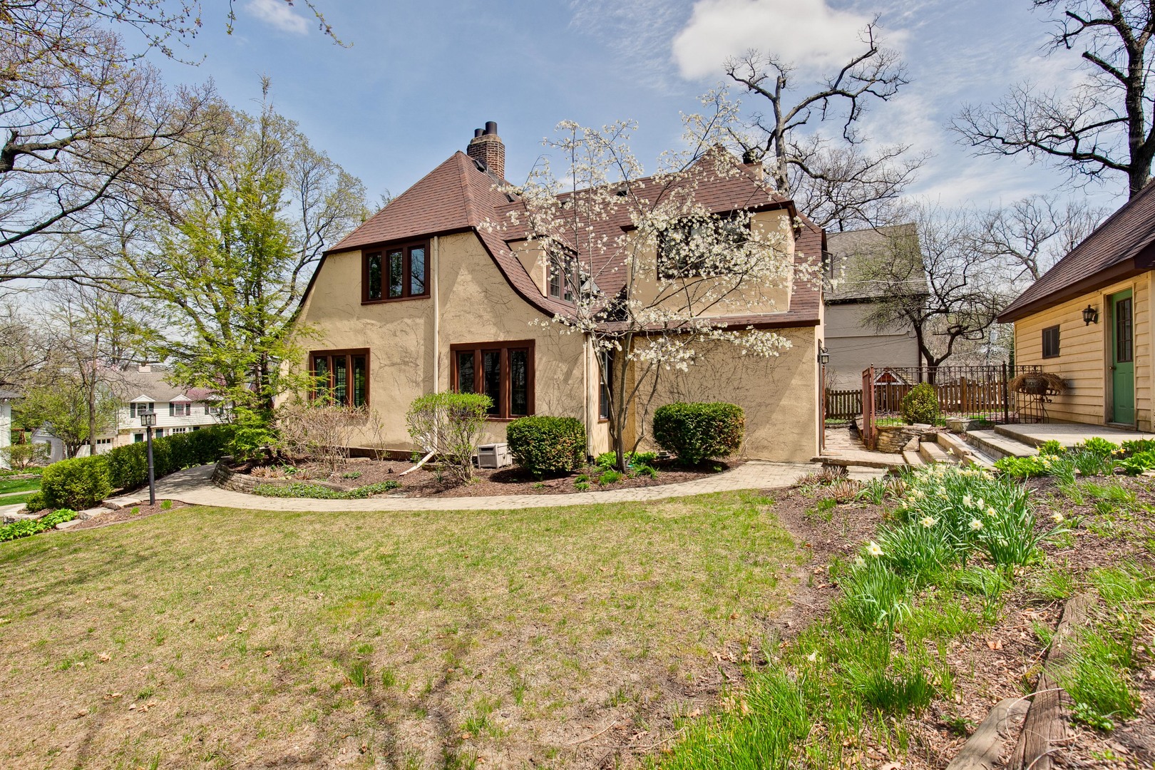 200 Ravine Road Hinsdale, IL 60521 - Photo 29 of 29 a view of a house with swimming pool and sitting area