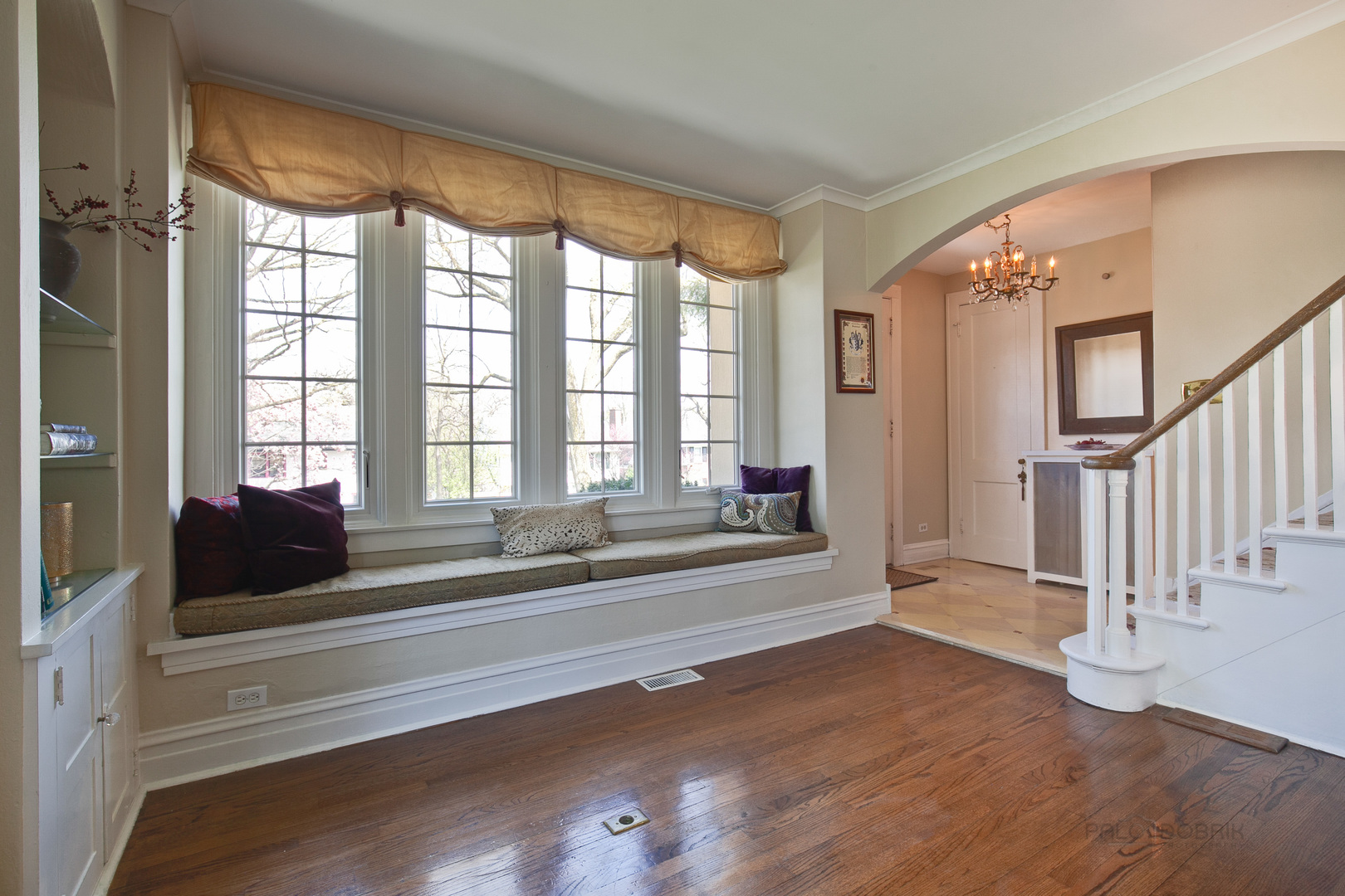 200 Ravine Road Hinsdale, IL 60521 - Photo 4 of 29 a living room with wooden floor and a fireplace