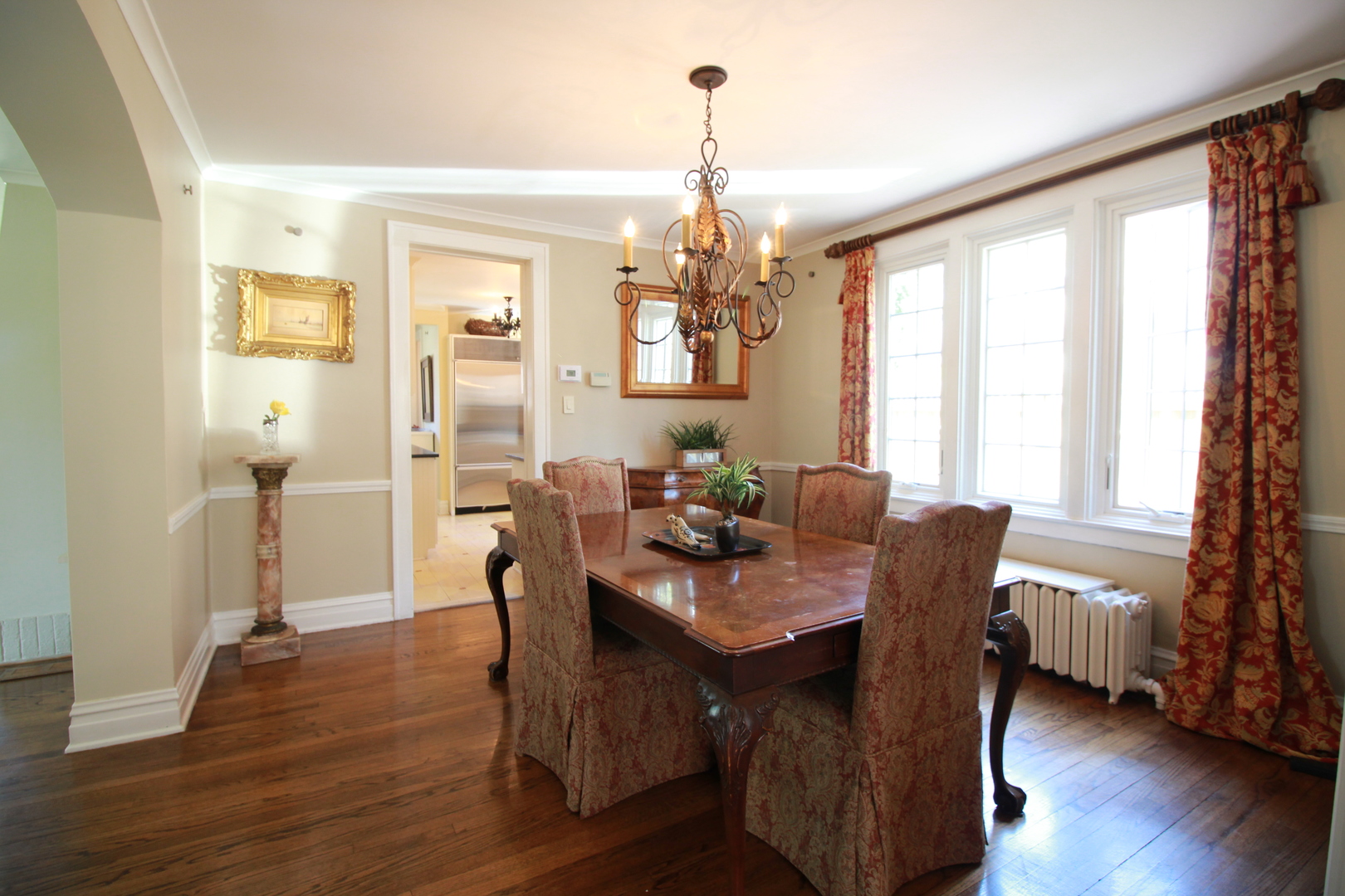 200 Ravine Road Hinsdale, IL 60521 - Photo 9 of 29 a view of a dining room with furniture window and wooden floor
