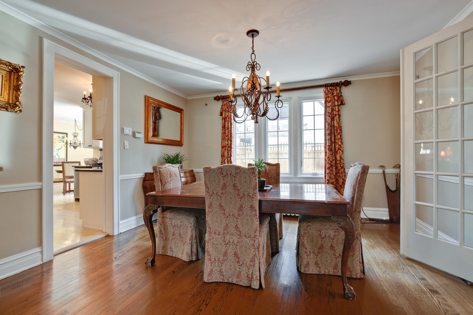 200 Ravine Road Hinsdale, IL 60521 - Photo 10 of 29 a view of a dining room with furniture window and wooden floor