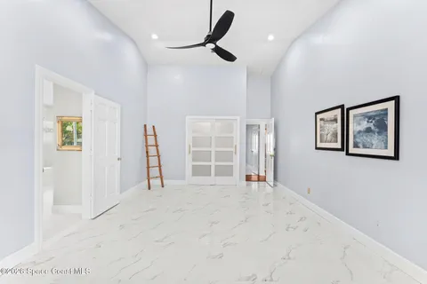 a view of a livingroom with a flat screen tv