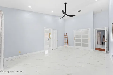 a view of a livingroom with furniture window and hardwood floor