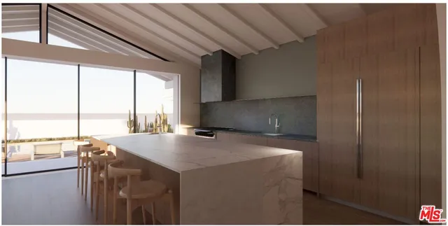 a kitchen that has a sink and a stove