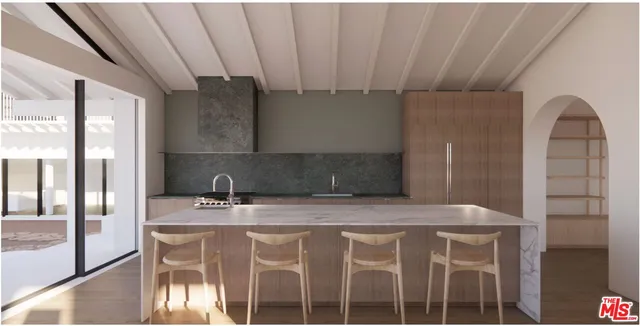 a bathroom with a granite countertop sink a mirror and shower