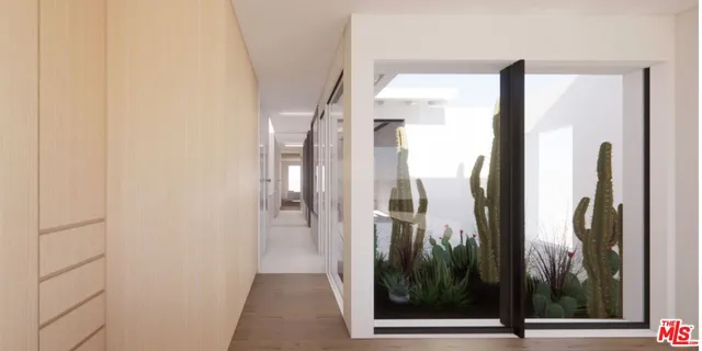 a view of a bathroom from a hallway