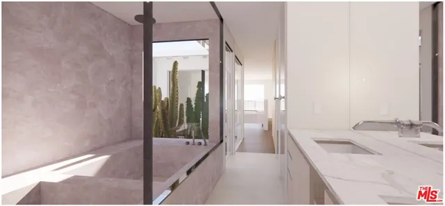 a bathroom with a tub sink and mirror