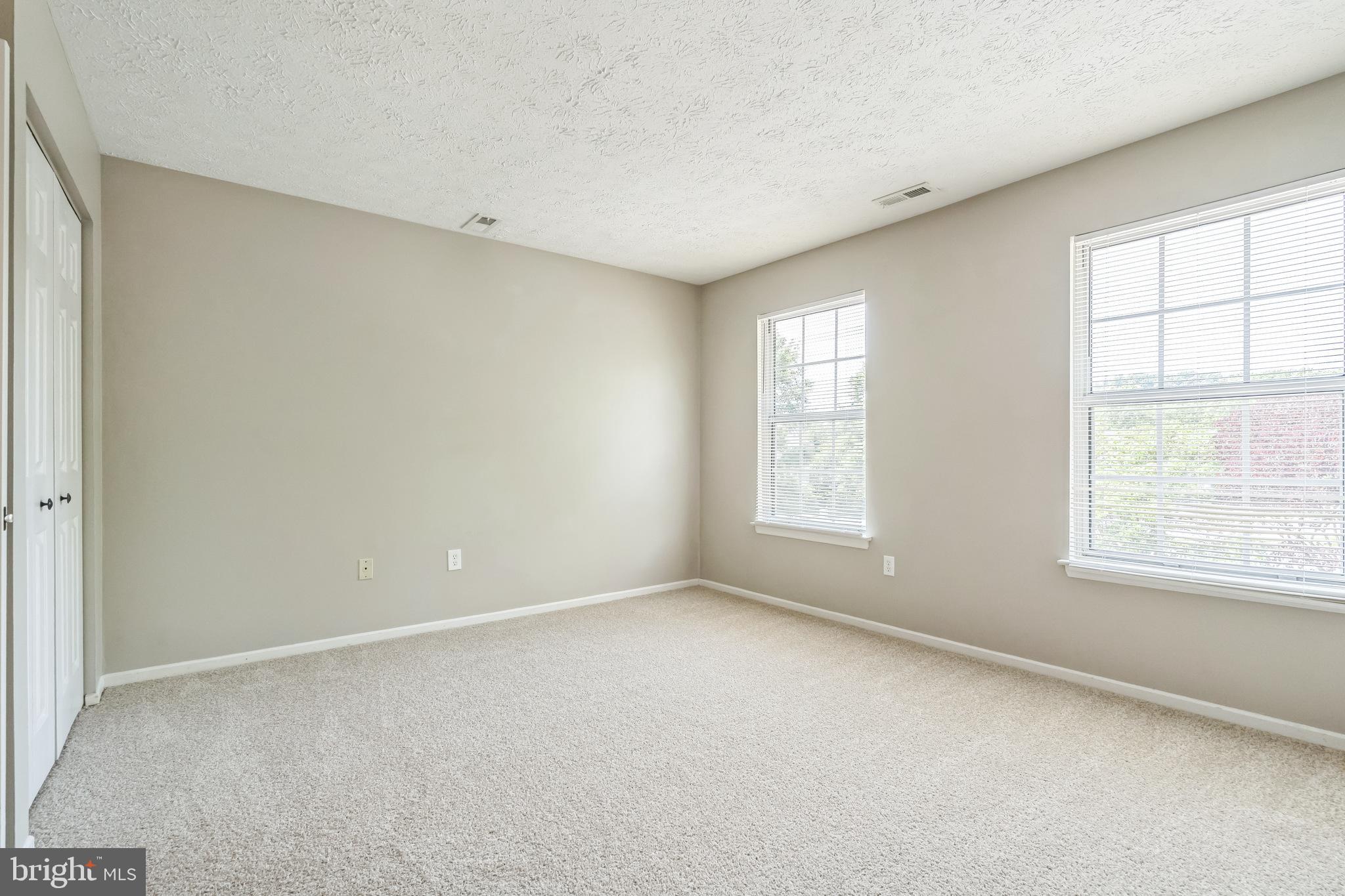 15 Beagle Run, Unit 98 Baltimore, MD 21236 - Photo 8 of 15 an empty room with a window