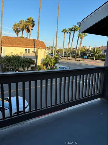 a view of a street from a balcony