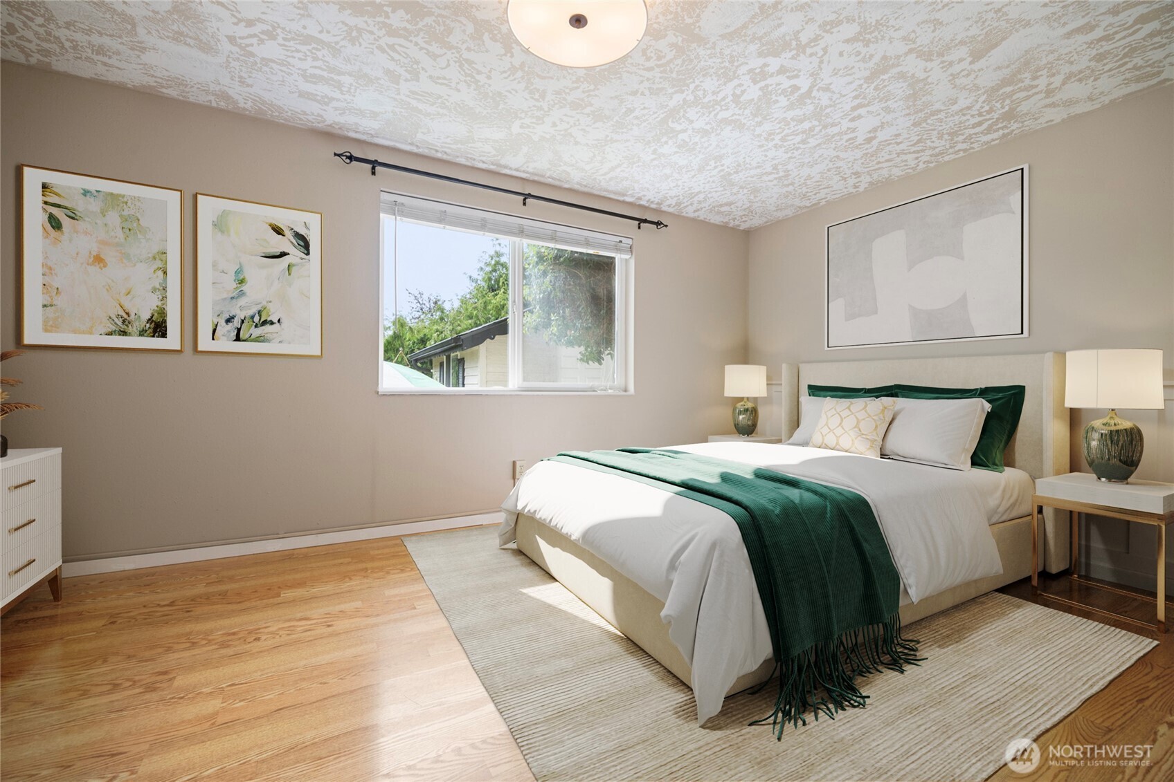 1000 Samish Way Bellingham, WA 98229 - Photo 22 of 40 a bedroom with a large bed and a painting on the wall