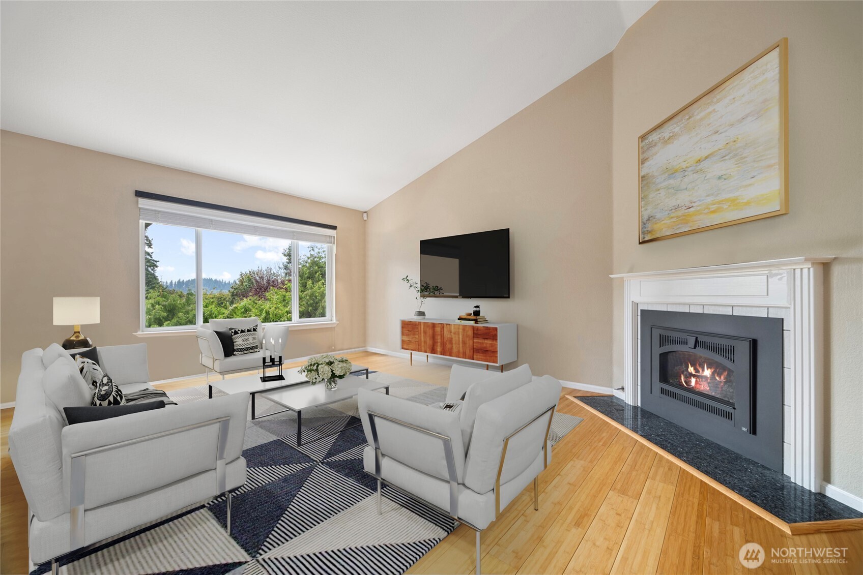 1000 Samish Way Bellingham, WA 98229 - Photo 4 of 40 a living room with furniture a flat screen tv and a fireplace