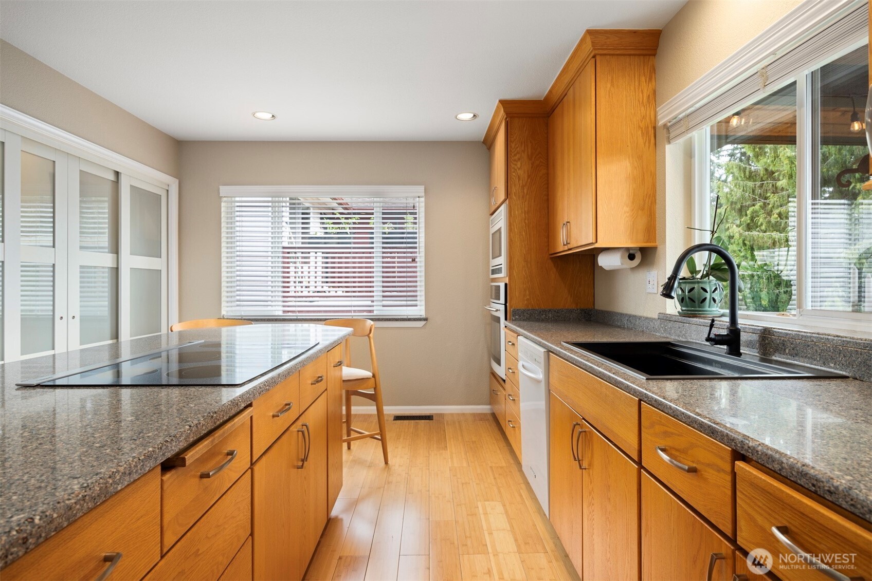 1000 Samish Way Bellingham, WA 98229 - Photo 10 of 40 a kitchen with granite countertop a sink and a large window