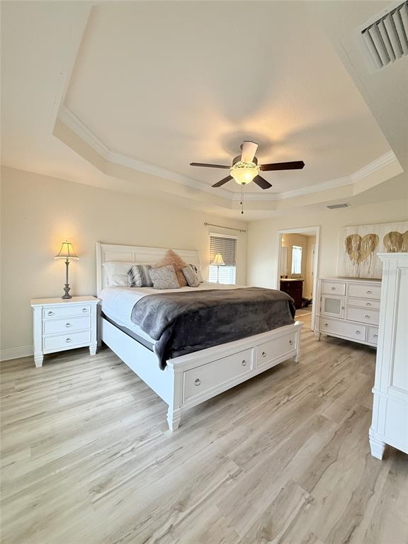 186 Northwest 44th Street Ocala, FL 34475 - Photo 13 of 36 a bedroom with a bed and a night stand