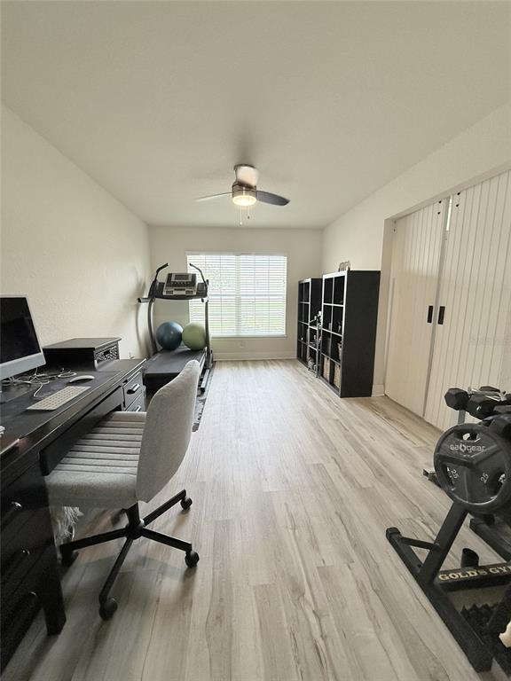 186 Northwest 44th Street Ocala, FL 34475 - Photo 19 of 36 a view of a workspace with furniture and a window