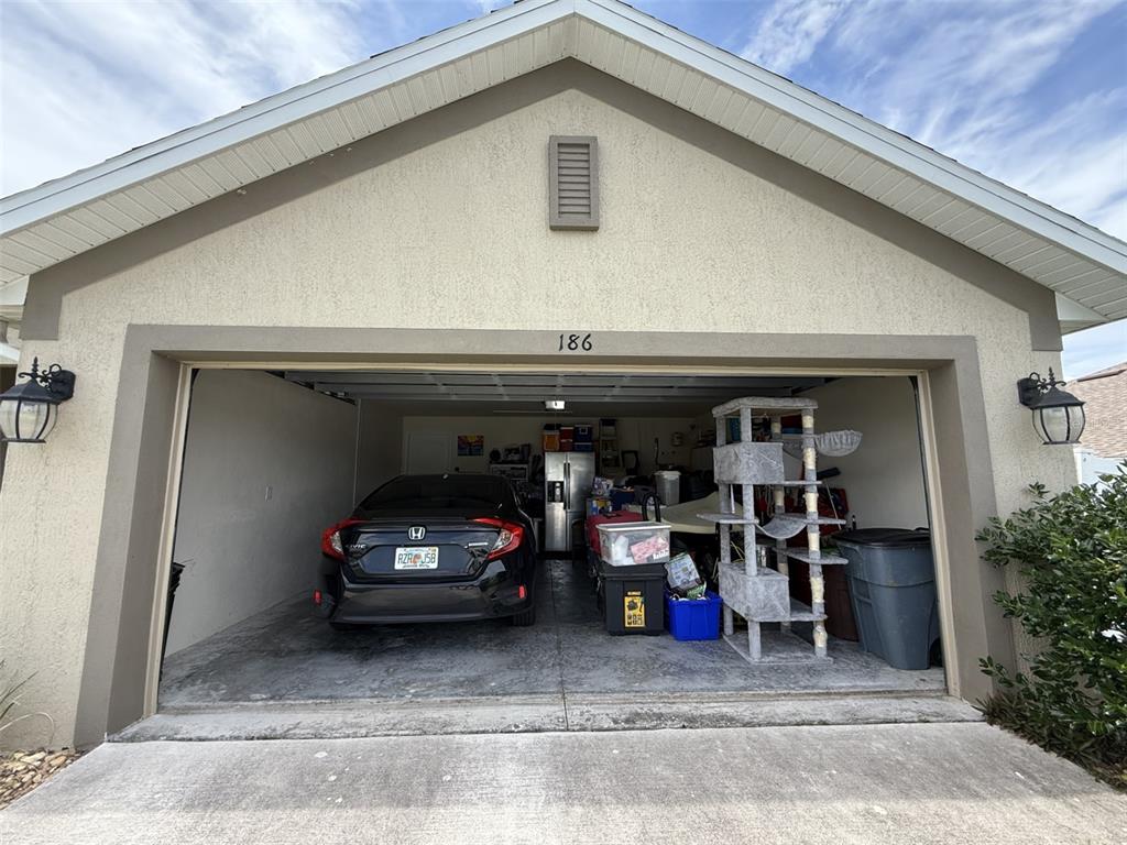 186 Northwest 44th Street Ocala, FL 34475 - Photo 36 of 36 a view of a car garage