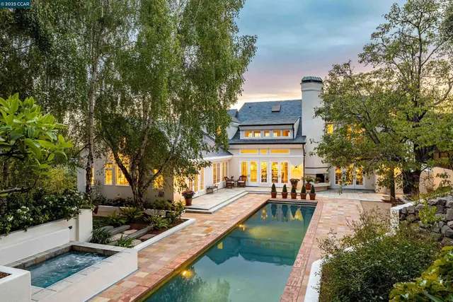 a view of a street with houses on both side