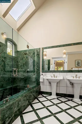 a view of a bathroom with sink and garden