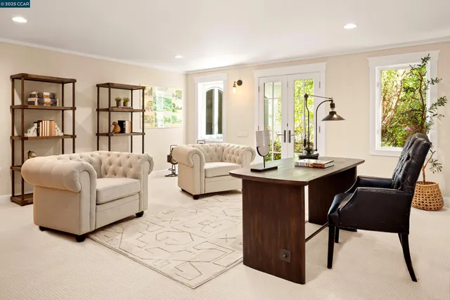 a bedroom with furniture and a chandelier