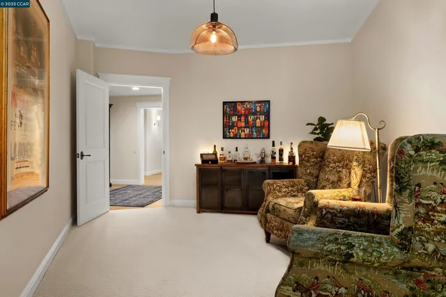 a front view of house with a garden