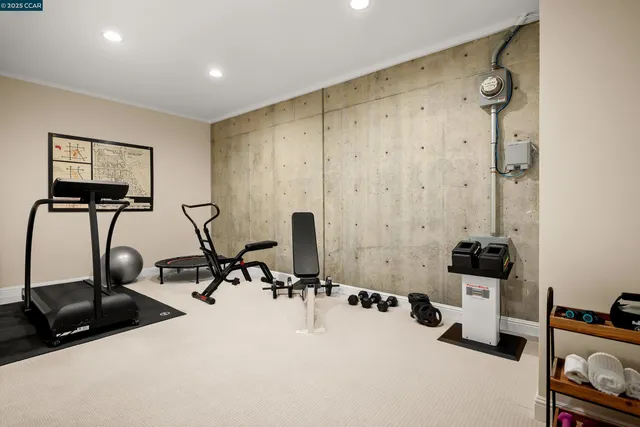 a view of a chairs and table in the back yard of the house
