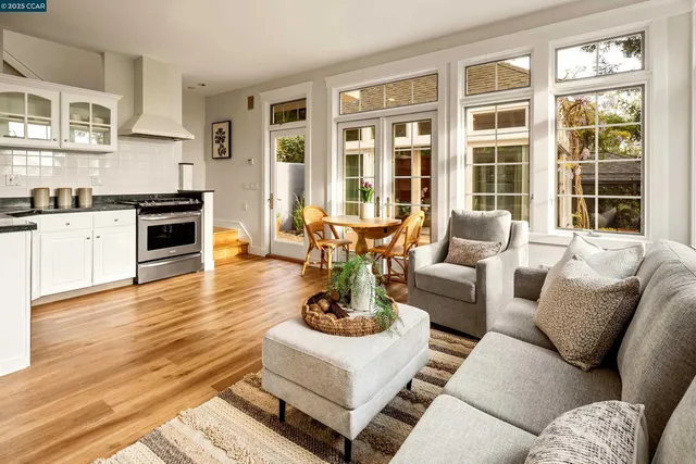 a lobby with furniture and floor to ceiling windows