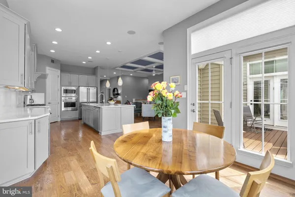 a view of walk in closet with clothes