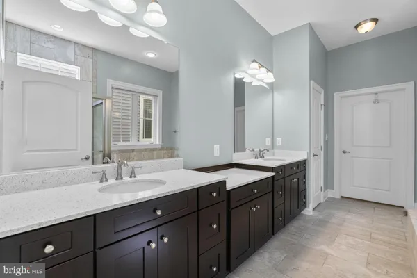 a view of a livingroom with workspace and a couch