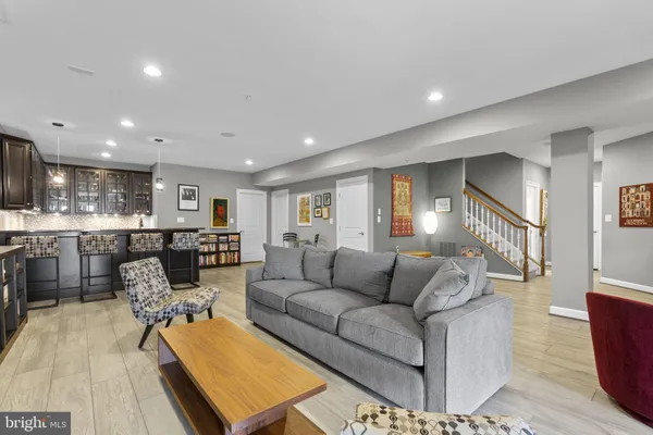 an aerial view of residential houses with outdoor space and parking