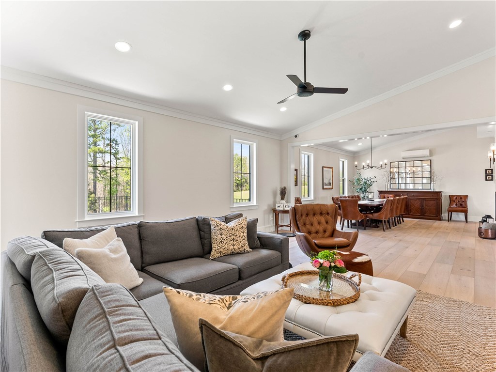 331 Bakerville Road Easley, SC 29642 - Photo 14 of 43 This inviting space features an open-concept living and dining area with abundant natural light.