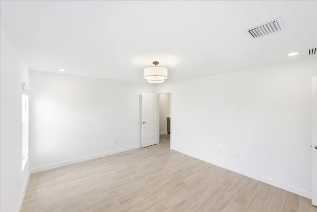 a bathroom with a double vanity sink mirror and double