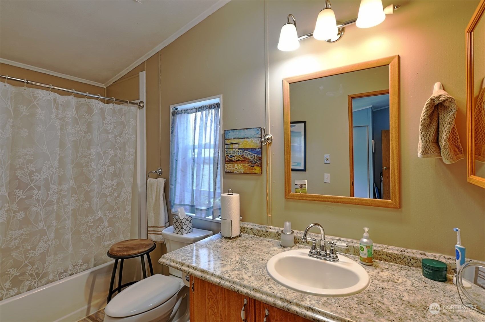 23825 15th Avenue Southeast, Unit 93 Bothell, WA 98021 - Photo 13 of 21 a bathroom with a double vanity sink and a mirror