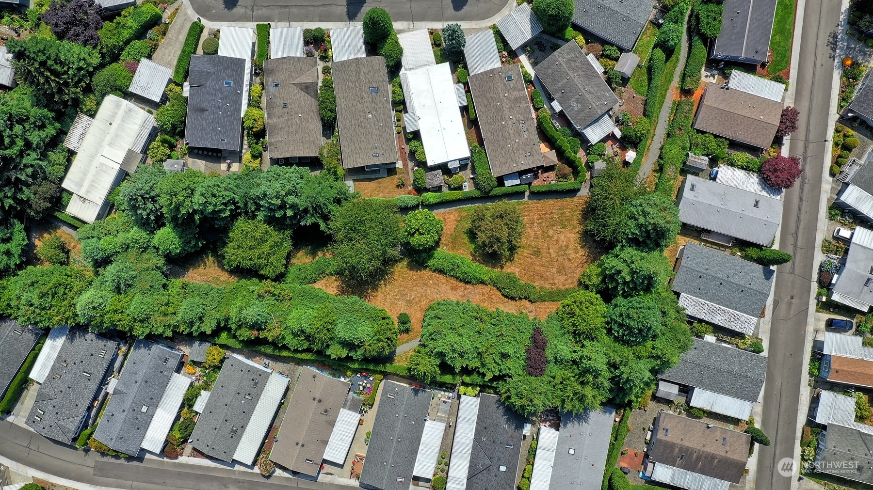 23825 15th Avenue Southeast, Unit 93 Bothell, WA 98021 - Photo 20 of 21 an aerial view of residential house with outdoor space and parking