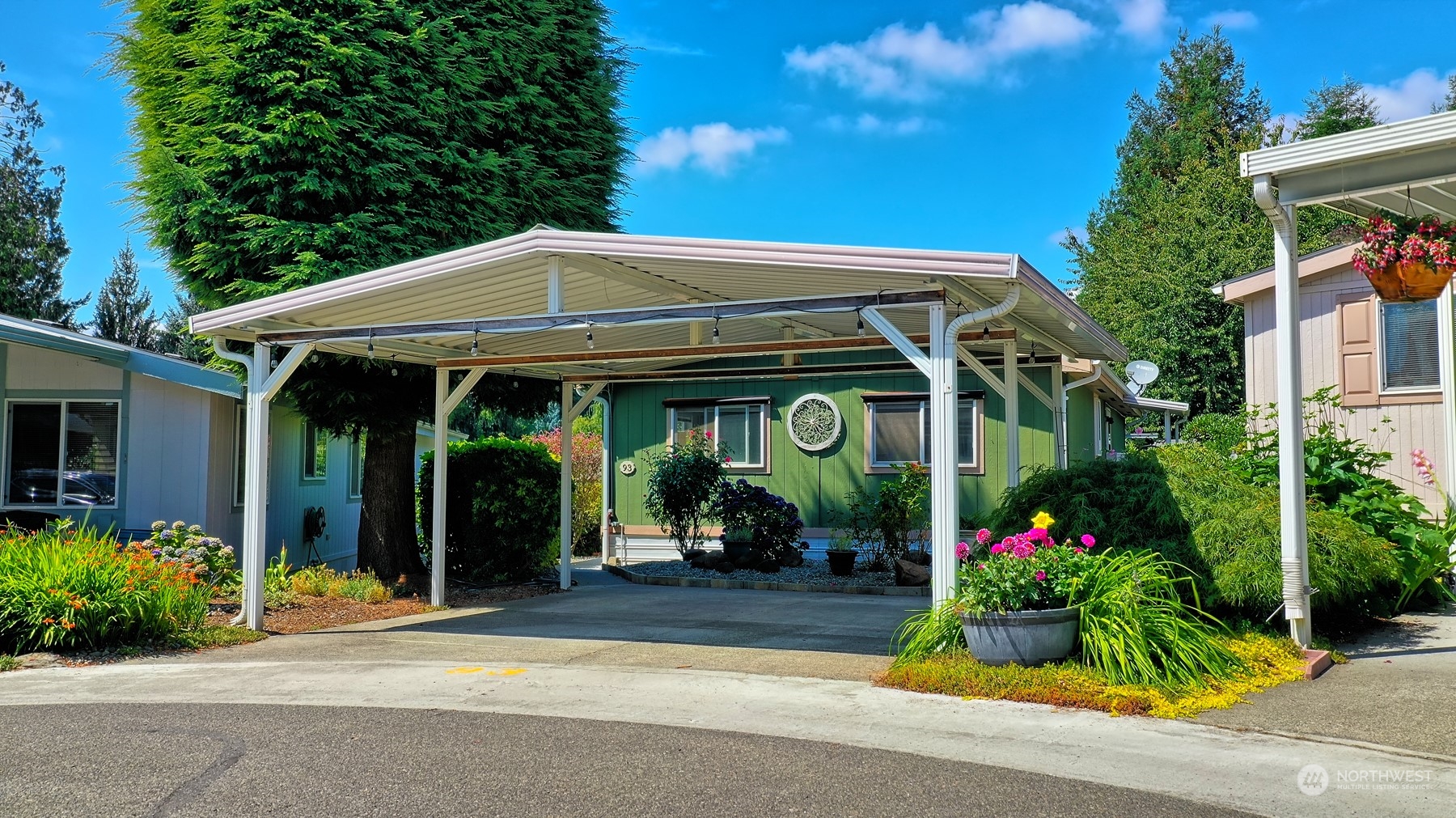 23825 15th Avenue Southeast, Unit 93 Bothell, WA 98021 - Photo 3 of 21 a view of a chair and tables in patio of the house