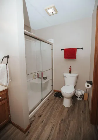 a bathroom with a toilet and a sink