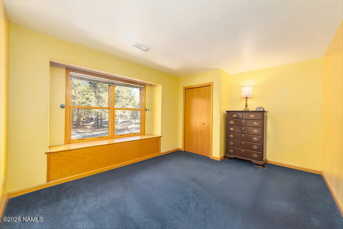 360 South Golden Mdws Trail Williams, AZ 86046 - Photo 17 of 29 Bedroom with Storage Ledge