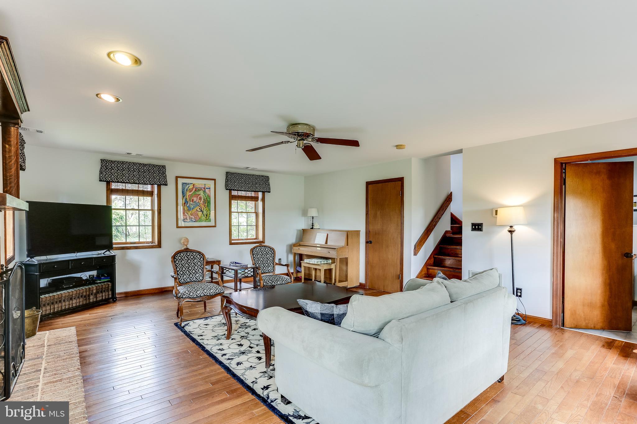 13829 Howard Road Dayton, MD 21036 - Photo 20 of 42 Living Room w/wood burning fireplace