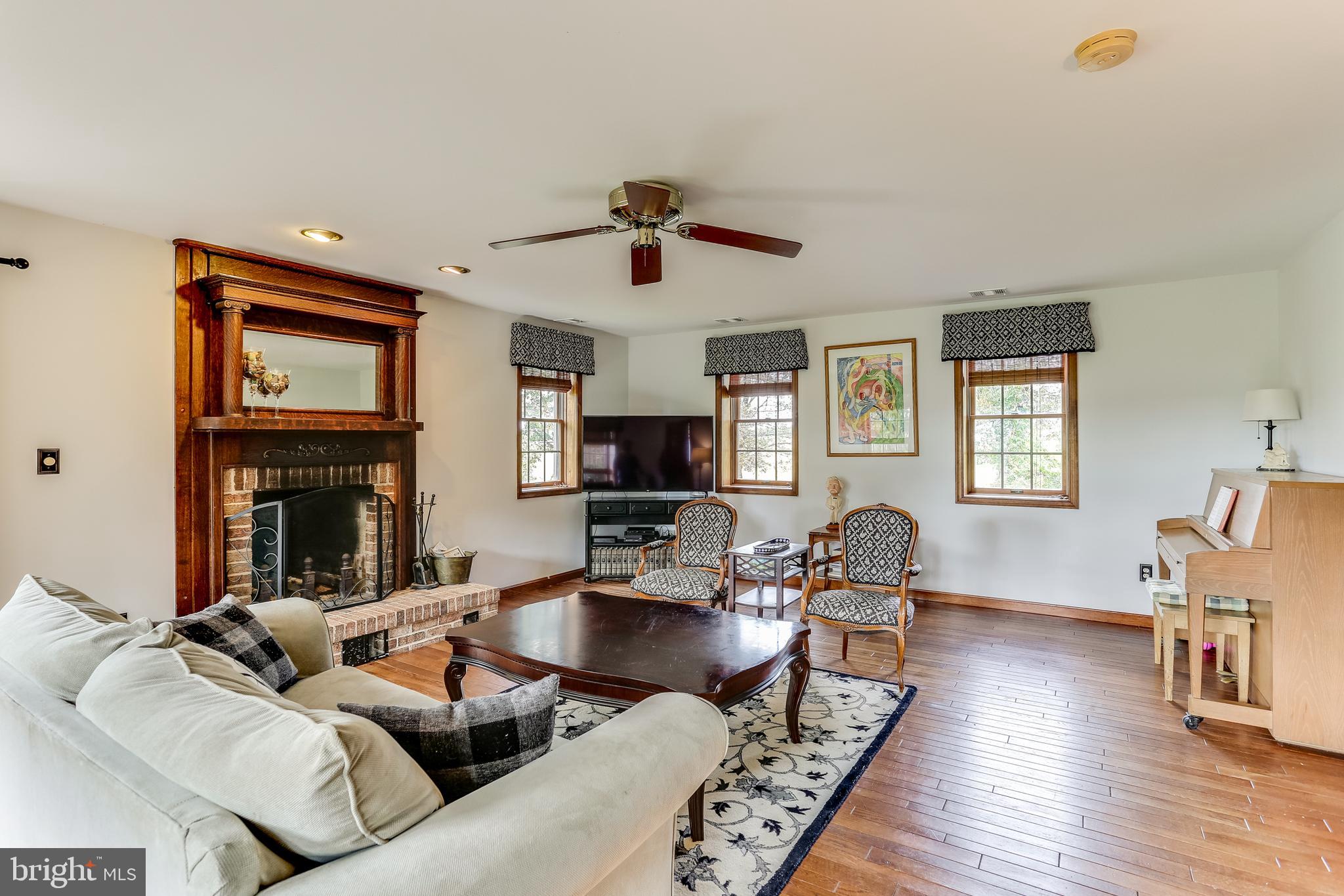 13829 Howard Road Dayton, MD 21036 - Photo 21 of 42 Living Room w/wood burning fireplace