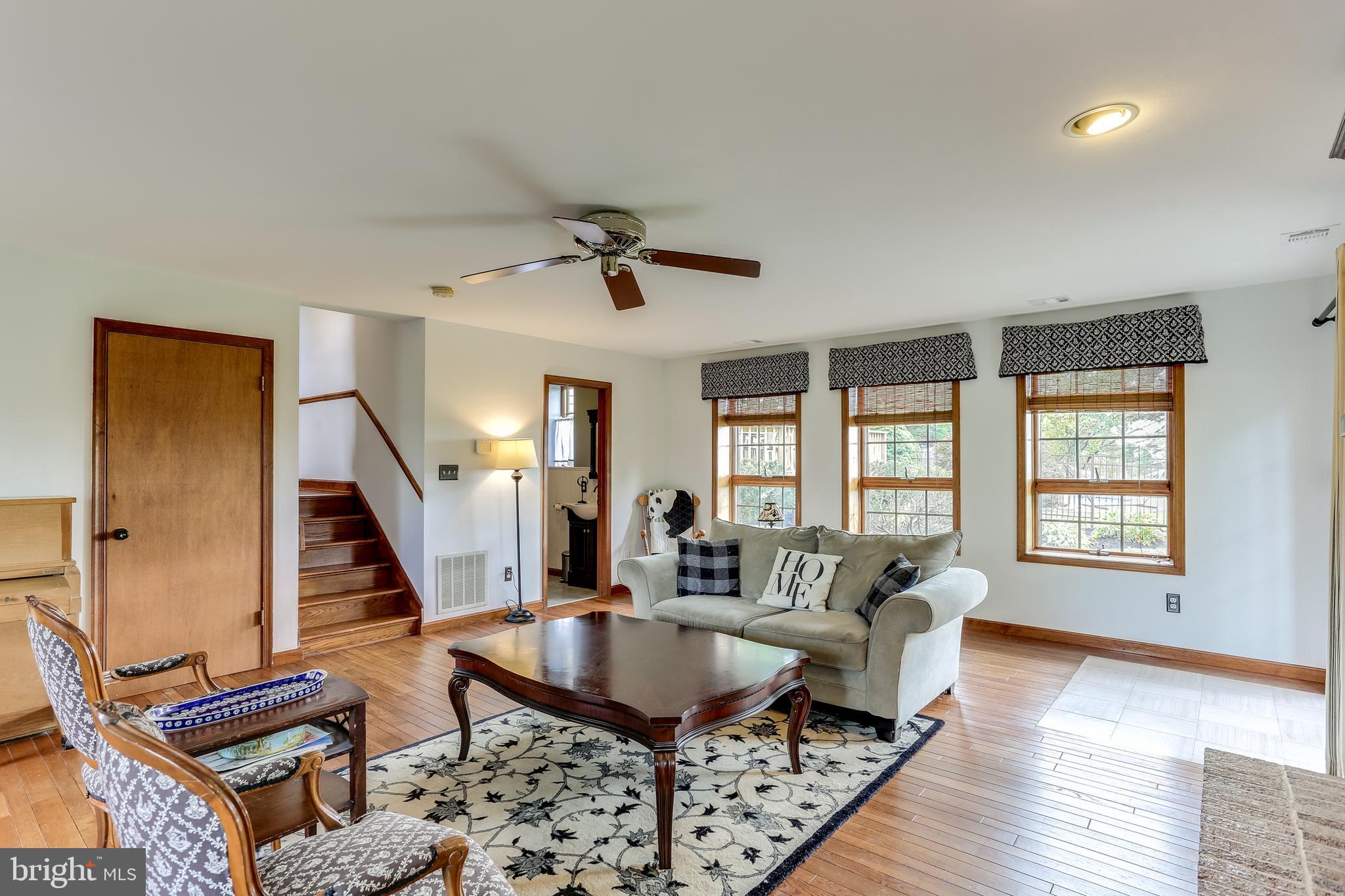 13829 Howard Road Dayton, MD 21036 - Photo 22 of 42 Living Room w/wood burning fireplace