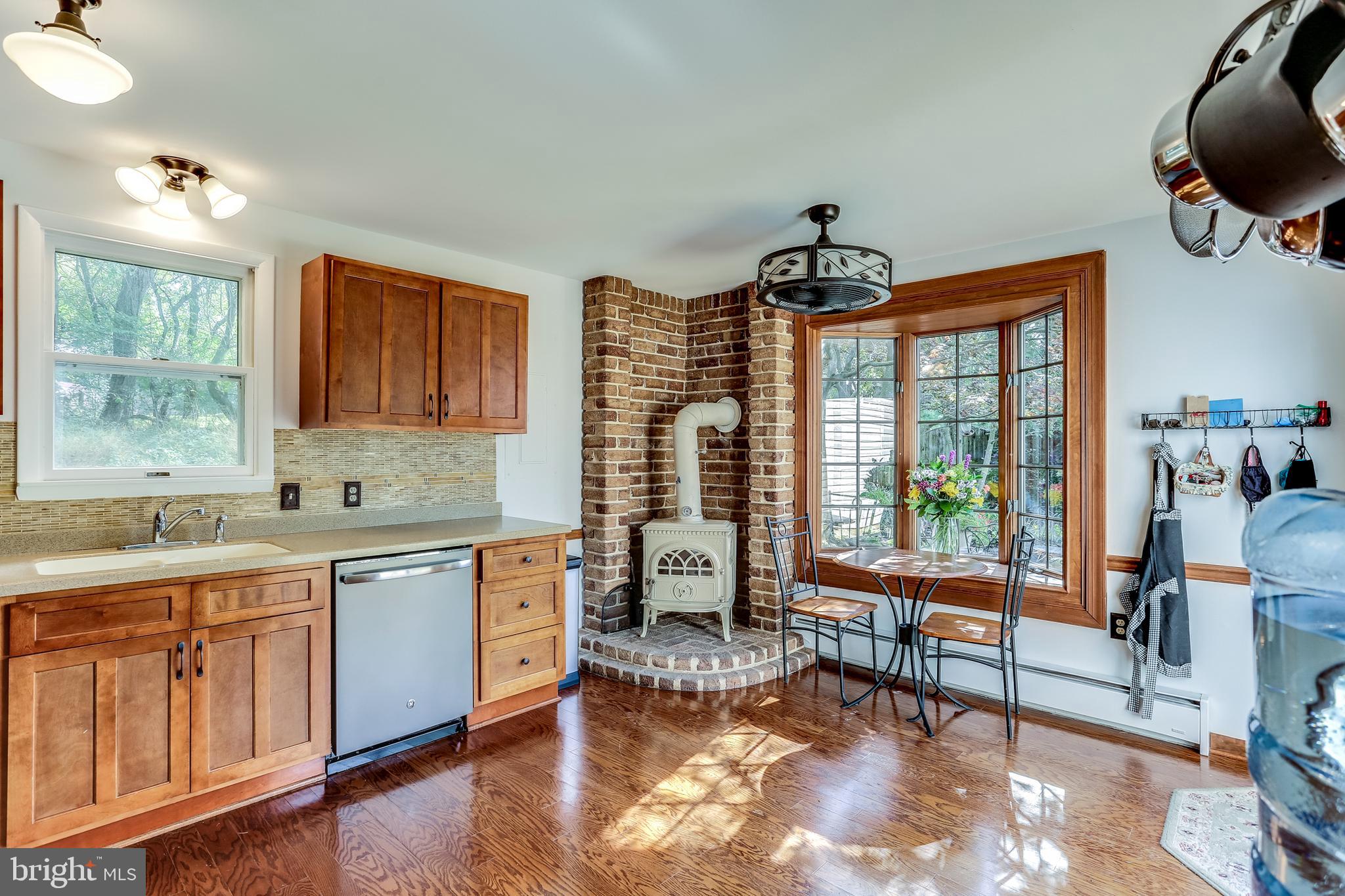 13829 Howard Road Dayton, MD 21036 - Photo 10 of 42 Kitchen w/wood burning stove and bay window