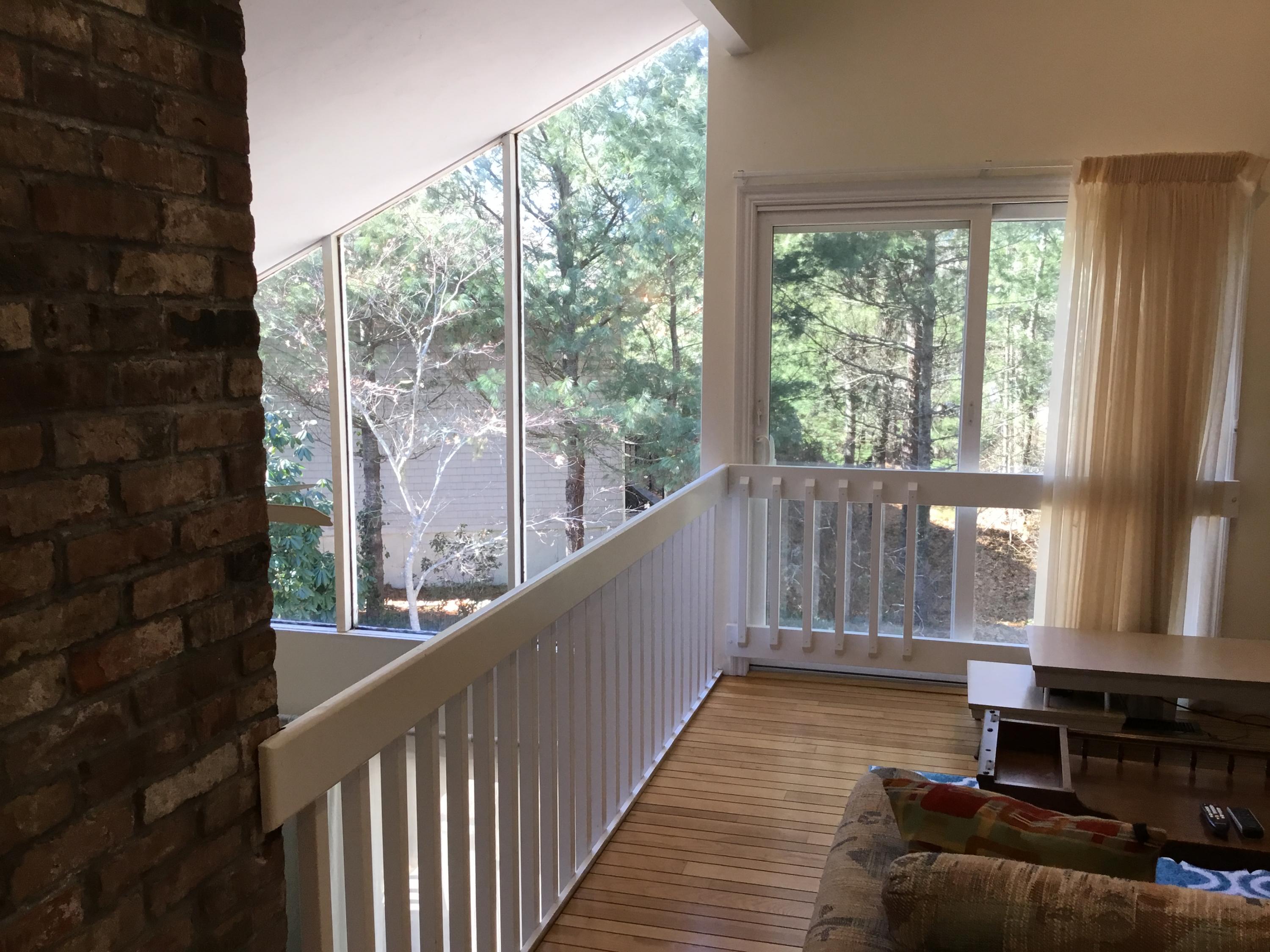 198 Fells Pond Road Mashpee, MA 02649 - Photo 17 of 33 a view of a balcony with wooden floor