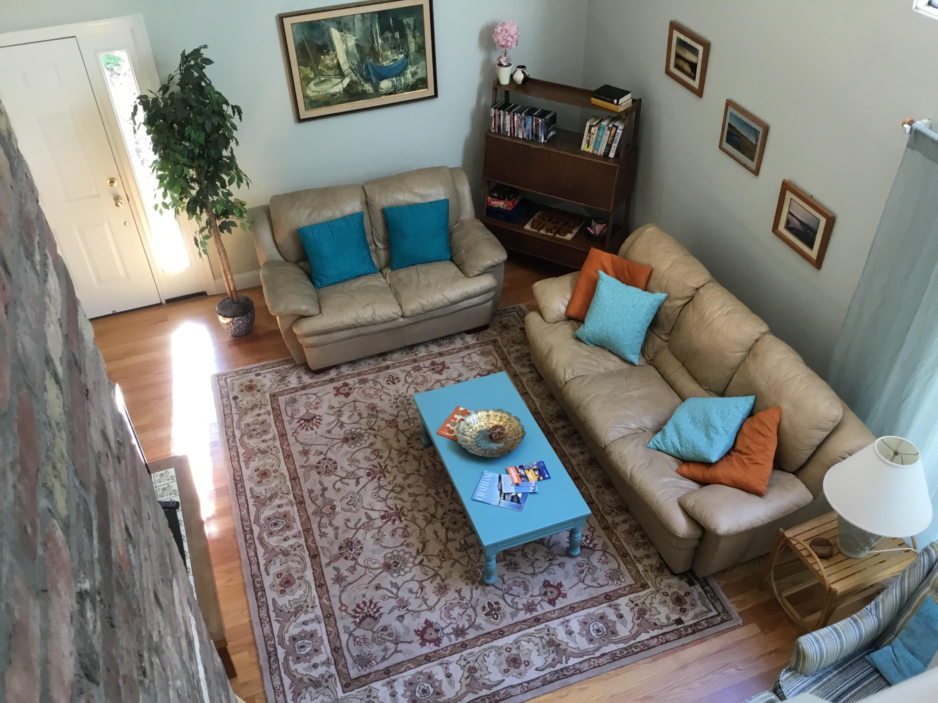 198 Fells Pond Road Mashpee, MA 02649 - Photo 29 of 33 a living room with furniture and a rug