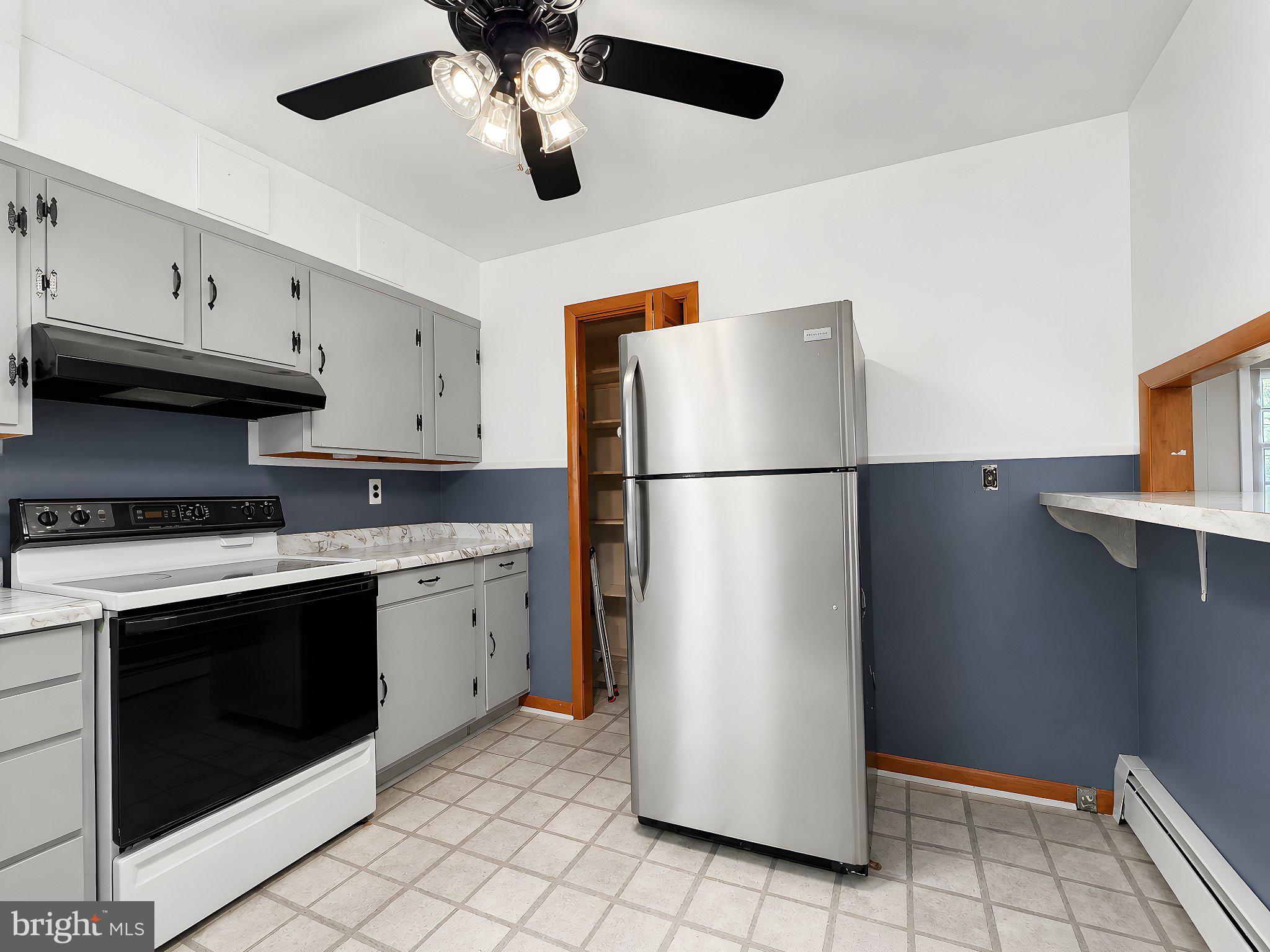 13315 Point Lookout Road Ridge, MD 20680 - Photo 19 of 51 Charming kitchen with modern touches.