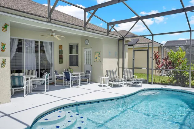 a room with lots of table and chairs