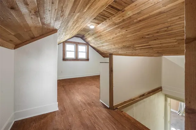 a very nice looking room with wooden floor