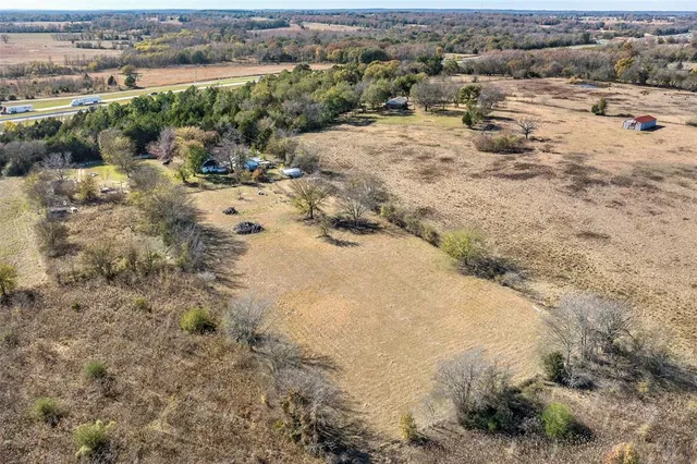 a view of a lake with lots of trees