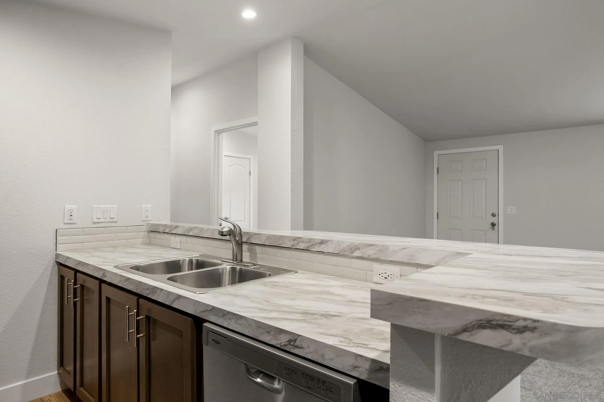 22899 Byron Road, Unit SPC 108 Crestline, CA 92325 - Photo 12 of 27 a kitchen with granite countertop a sink and cabinets