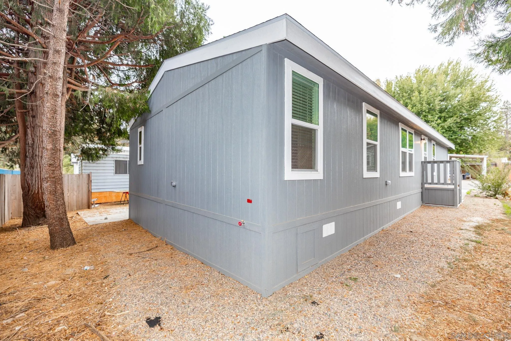 22899 Byron Road, Unit SPC 108 Crestline, CA 92325 - Photo 18 of 27 a view of a house with a snow in the background