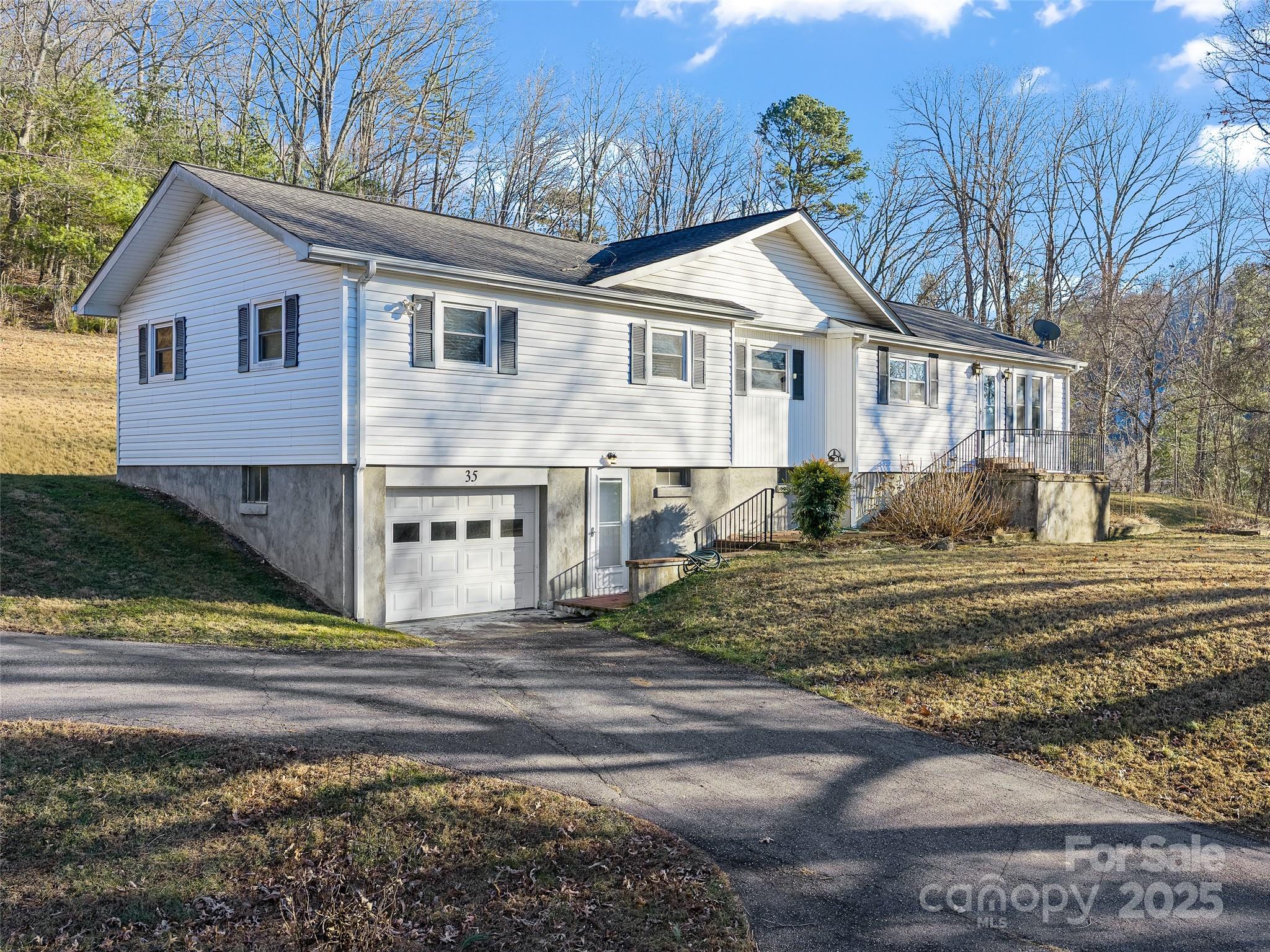 35 Smith Rdg Drive Asheville, NC 28803 - Photo 1 of 38 a front view of a house with a yard