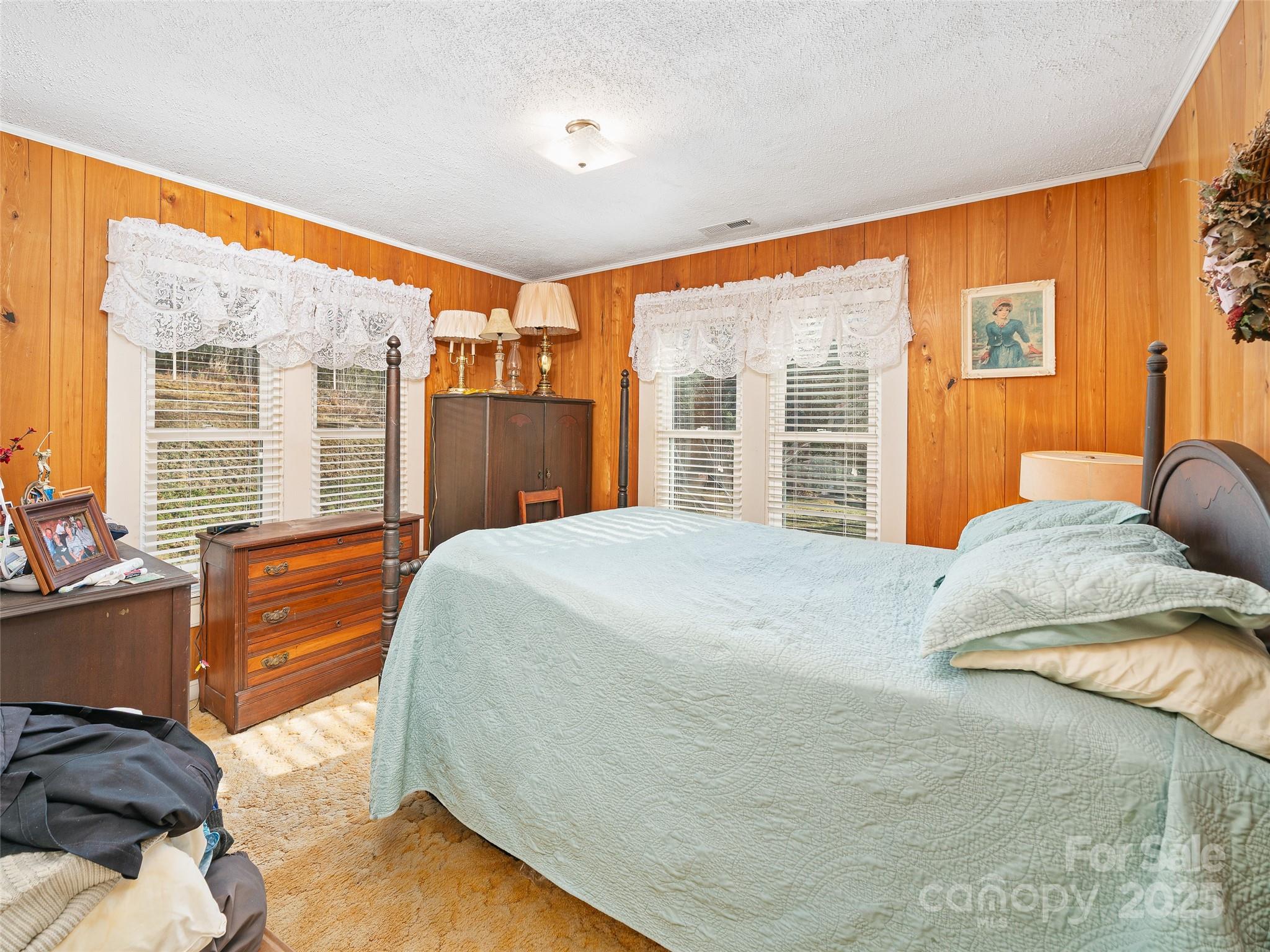 35 Smith Rdg Drive Asheville, NC 28803 - Photo 12 of 38 a bedroom with a large bed and a large window
