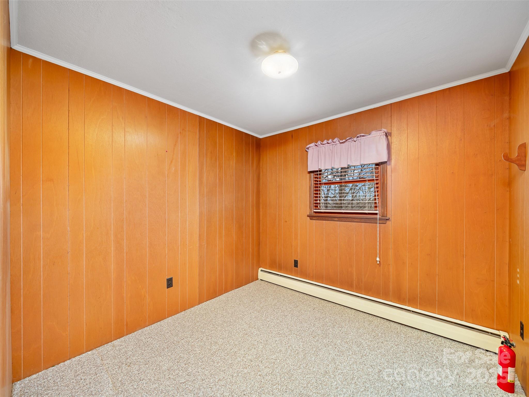 35 Smith Rdg Drive Asheville, NC 28803 - Photo 19 of 38 a view of a big room with a window and a ceiling fan